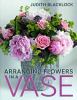 Go to record Arranging flowers in a vase